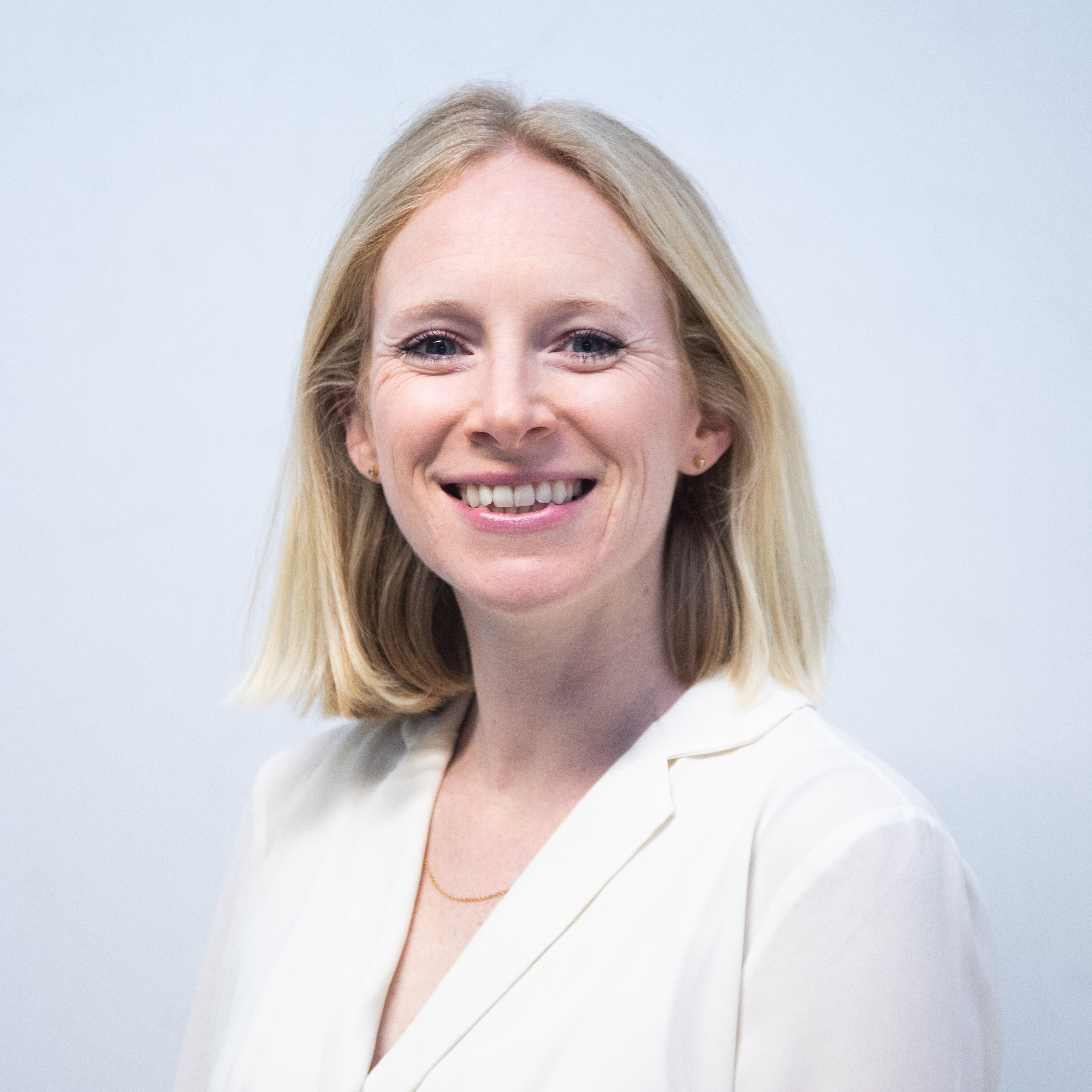 Isabel Martin against pale blue background