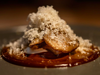 Beautiful vegetable and cheese dish against brown background at Lunario restaurant, Mexico