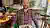Man holding box of vegetables in THE BUXTON London