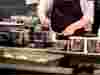 Chef in kitchen preparing food