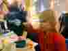 Child eating food at Windmill Hill City Farm Café